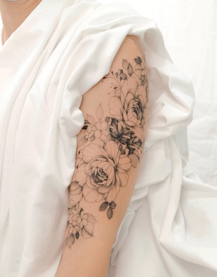 Flowers in different sizes tattoo
