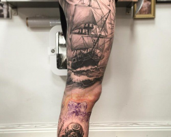 cool tattoo on the leg