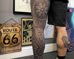 cool tattoo on the leg