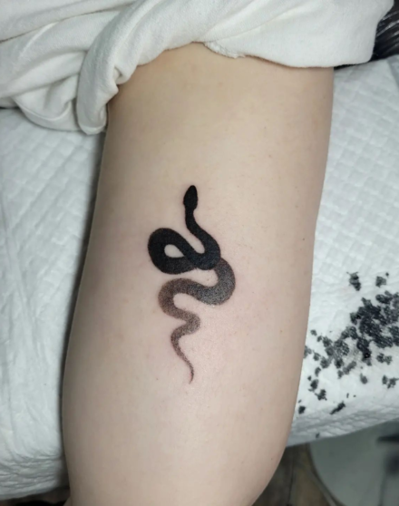 tattoo_of_cross on a hand