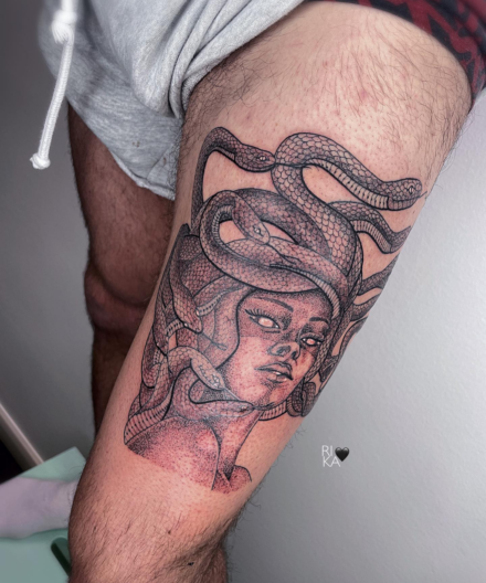 Compositions with snakes in tattoos