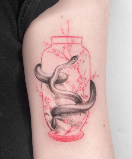 Compositions with snakes in tattoos