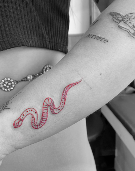 tattoo_of_cross on a hand