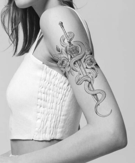 Compositions with snakes in tattoos