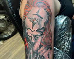 Masks and clowns in Chicano tattoos