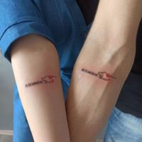 Small matching couple tattoo