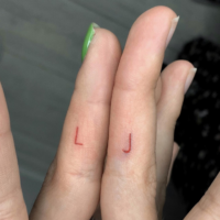 Small matching couple tattoo