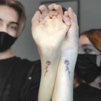 Small matching couple tattoo