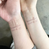 Small matching couple tattoo