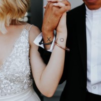 Small matching couple tattoo