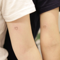 Small matching couple tattoo