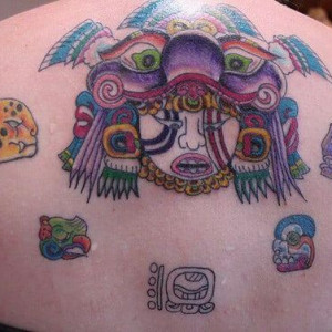 Aztec tattoos on back