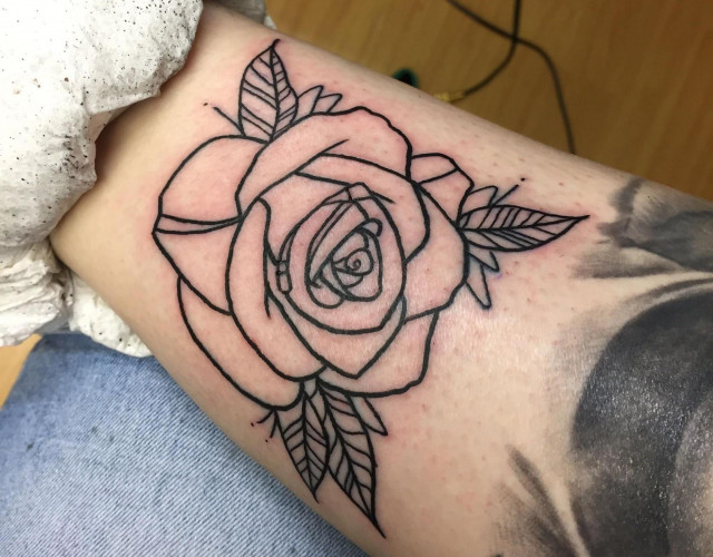 Outline rose tattoo