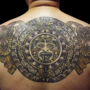 Aztec tattoos on back
