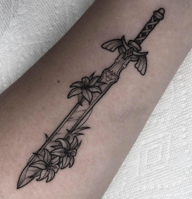 Sword with triangle tattoo design