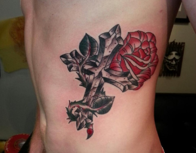 Cross and rose tattoo