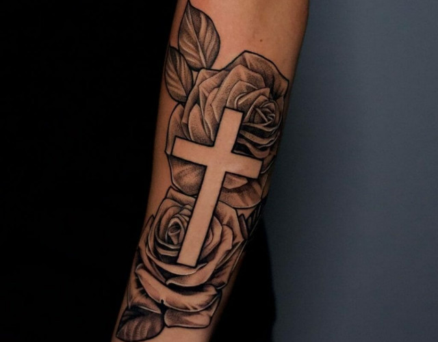 Cross and rose tattoo