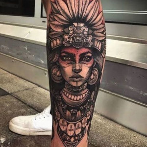 Aztec tattoos on legs