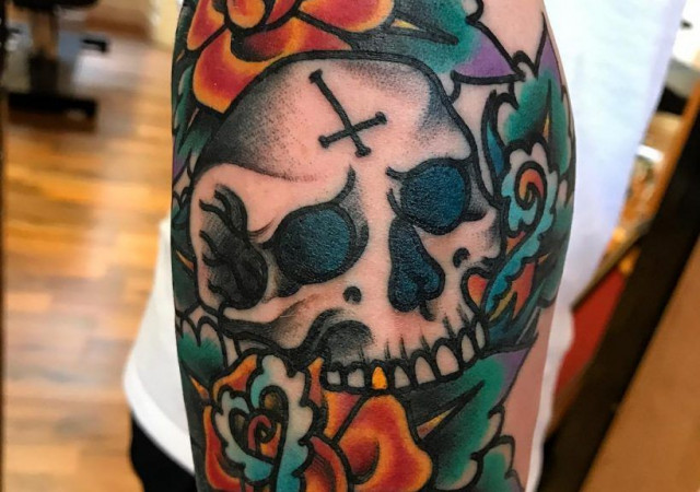 Rose and skull tattoo