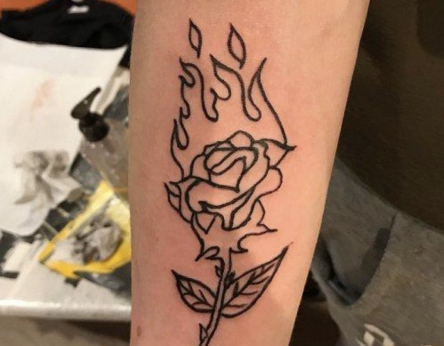 Outline rose tattoo