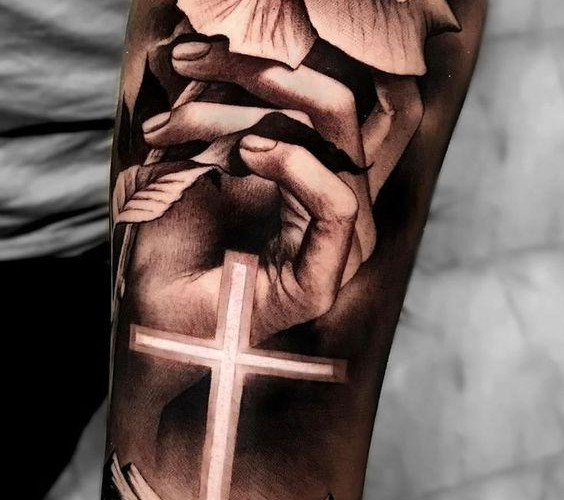 Cross and rose tattoo