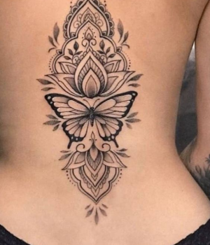 Butterfly mandala tattoo on the back