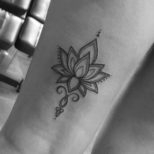 Lotus tattoo on the forearm