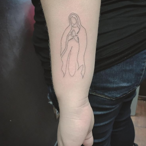 Minimalistic Catholic Mary Tattoo on the forearm
