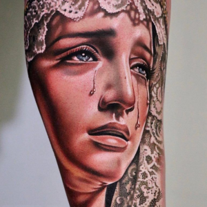 Catholic Mary Tattoo in Realism Style