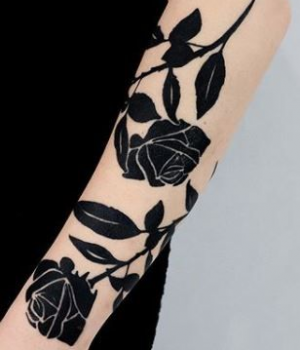 Black rose tattoo for men of the forearm
