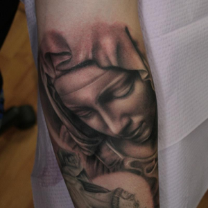 Catholic Mary Tattoo in Realism Style