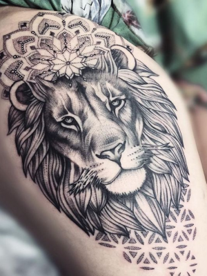 Lion mandala tattoo on the shoulder