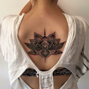 Lotus tattoo on the back