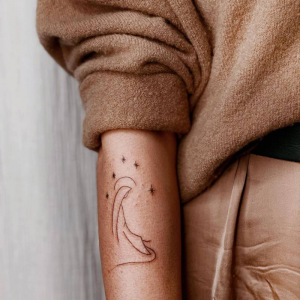 Minimalistic Catholic Mary Tattoo on the arm