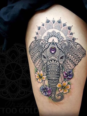 Elephant mandala tattoo on the thigh