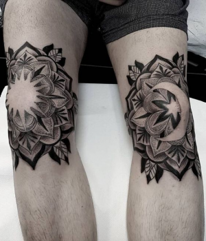 Sun and Moon tattoo on the knees