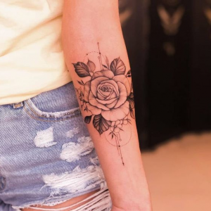 Rose tattoo on the forearm