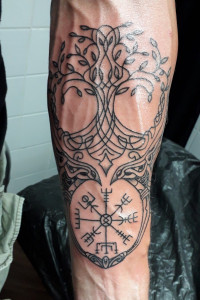 Abstract Yggdrasil with runes and eagles