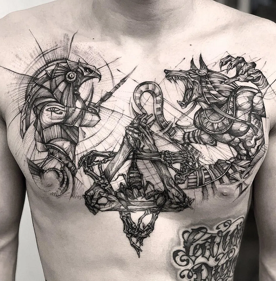 The tattoo of Anubis and Horus inked on the chest