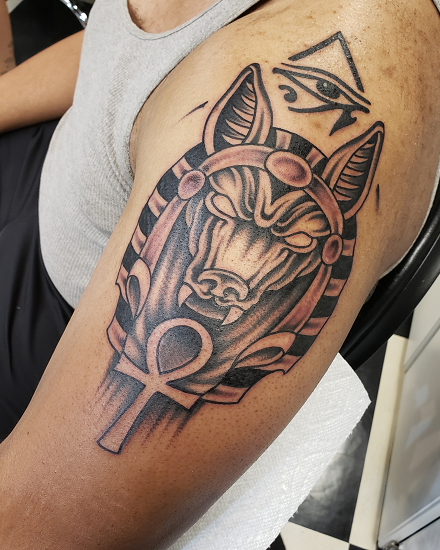 Tattoo of Anubis With an Eye
