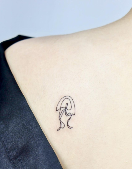 Negative space is a void or unfilled area in a tattoo, which is actively used in design to create contrast and emphasize positive elements, giving them special expressiveness and depth.