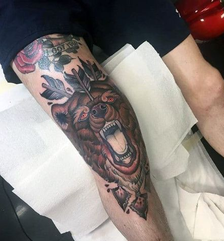 Tattoos on the Knee With Animals