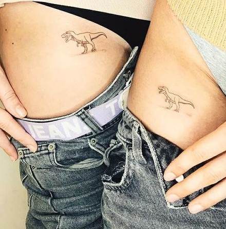 Couple Tattoos with Dinosaur Motifs