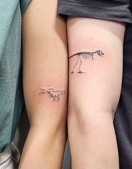 Couple Tattoos with Dinosaur Motifs