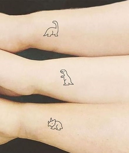 Couple Tattoos with Dinosaur Motifs