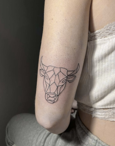 Geometric Cow Tattoo