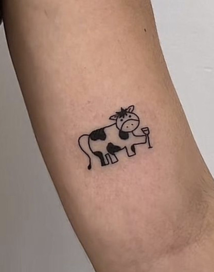 Minimalistic Cow Tattoo