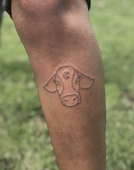 Minimalistic Cow Tattoo