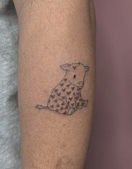 Cow With Hearts Tattoo