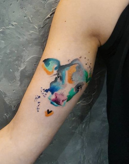Watercolor Cow Tattoo